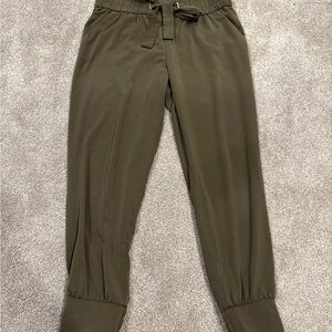Dynamite Sasha Belted Jogger Dress Pants in Olive Green